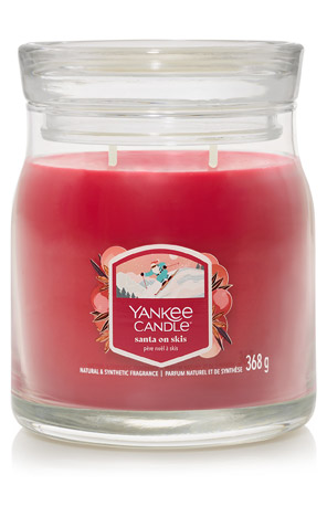Svijeća medium Signature Santa on skis Yankee Candle